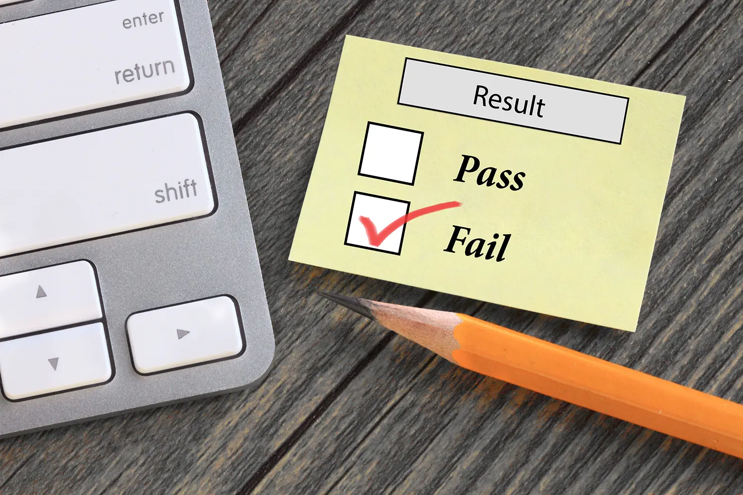 post-it note with check boxes for Pass and Fail; Fail is checked